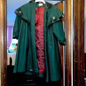 Emerald green, heavy duty, dress up kids jacket. Dry clean only.